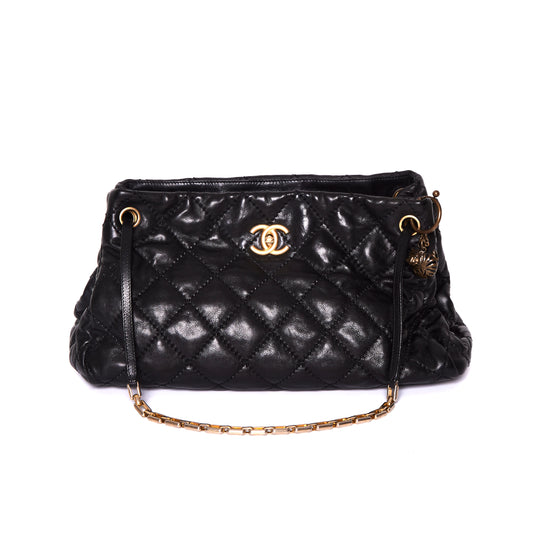 CHANEL Quilted Lion Charm Shoulder Bag