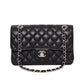 CHANEL 11.12 Classic black flap bag in caviar leather