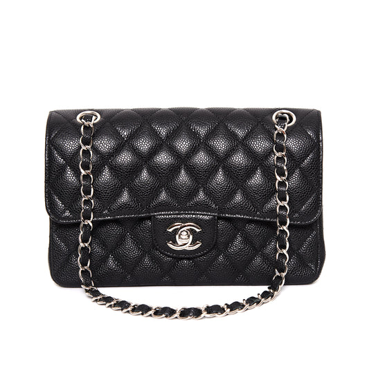 CHANEL 11.12 Classic black flap bag in caviar leather