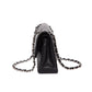 CHANEL 11.12 Classic black flap bag in caviar leather